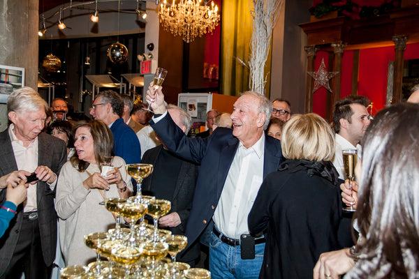 Celebrating Chef Alain Sailhac's 80th Birthday with a Champagne Toast
